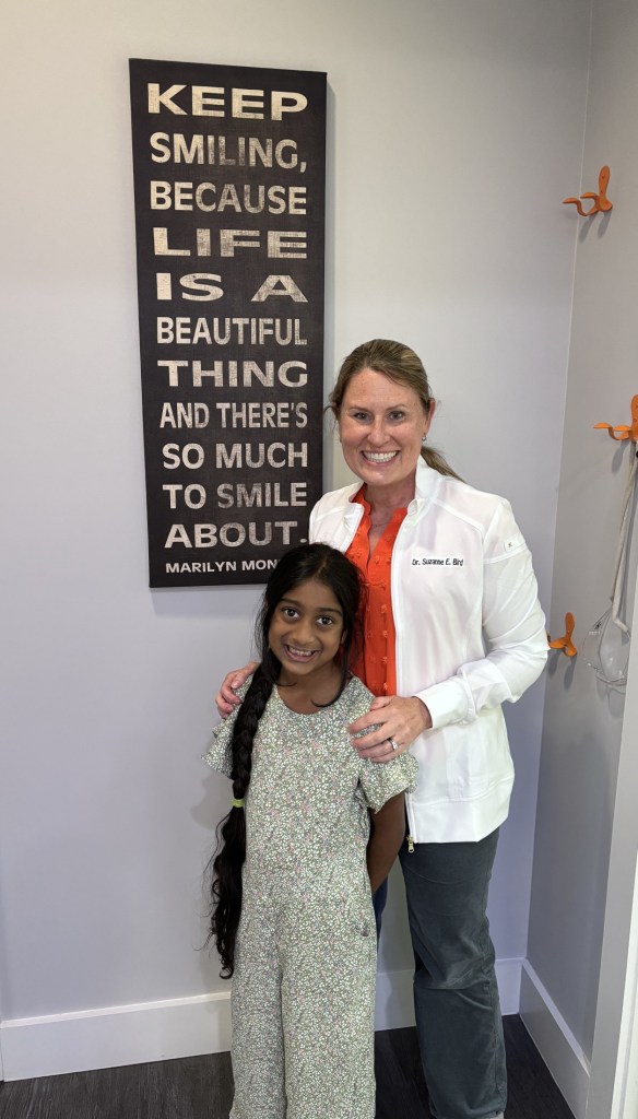 Dr. Suzanne Bird and a girl