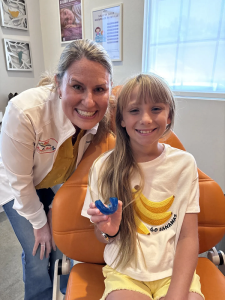 photo of dr. bird and a patient